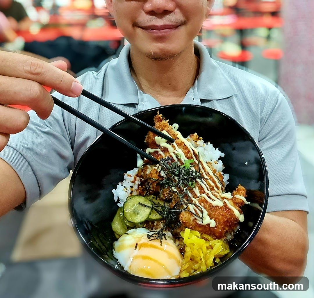 Person holding a bowl of food