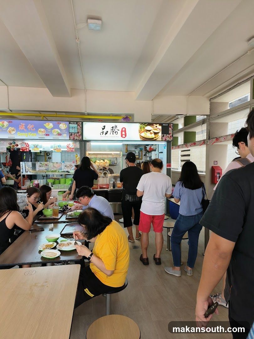 Busy Food Stall with Diners
