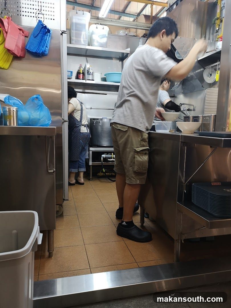 Kitchen Staff Preparing Food