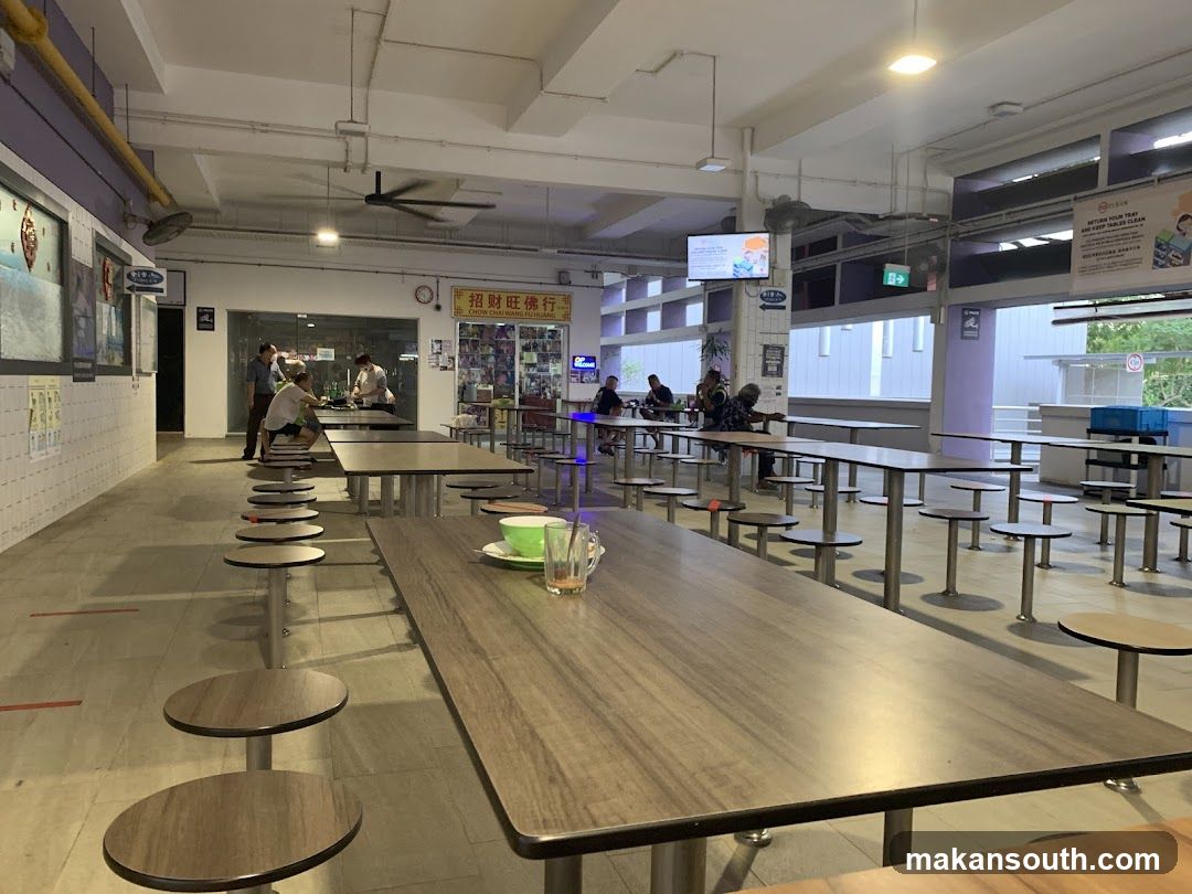 Food court interior with tables and chairs
