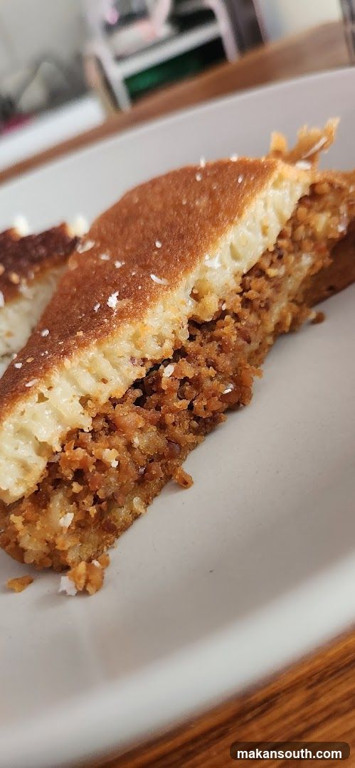Sweet Pancake with Coconut Filling