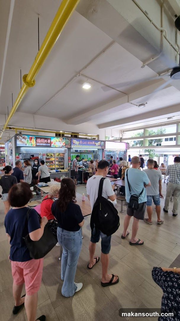 People queuing at food stalls