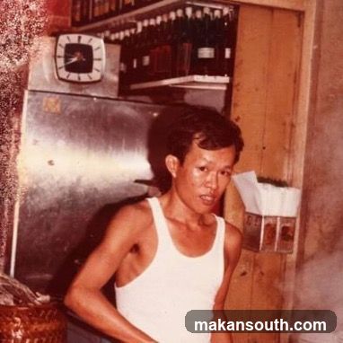 Man in a white tank top