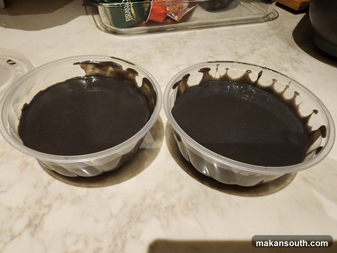 Two bowls of black sesame paste