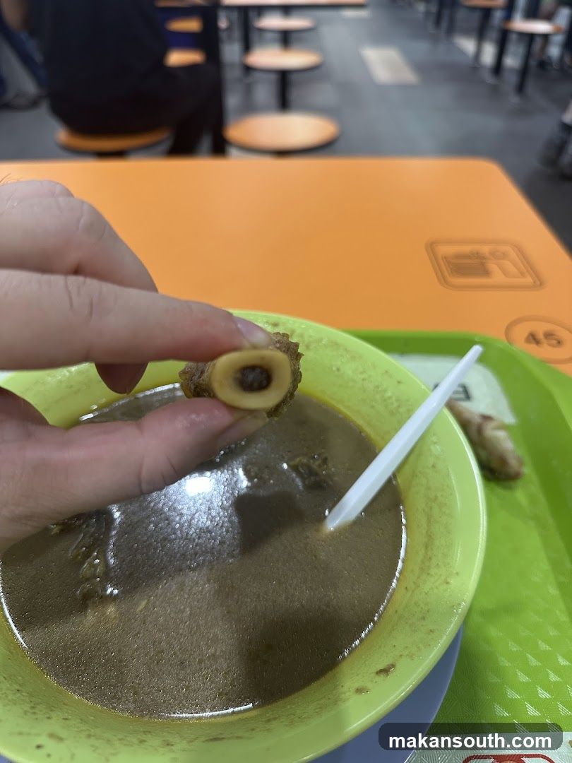 Close-up of a piece of bone marrow in soup