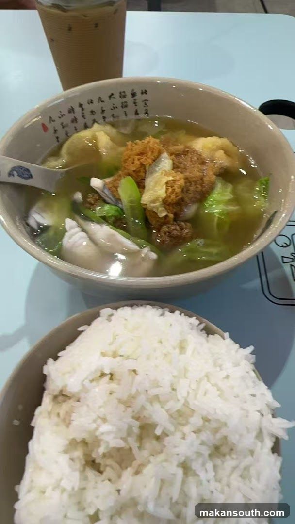 Fish soup with rice and iced drink