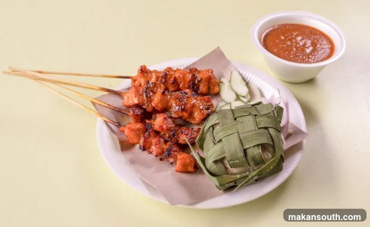 Chicken Satay with Peanut Sauce and Rice Cake