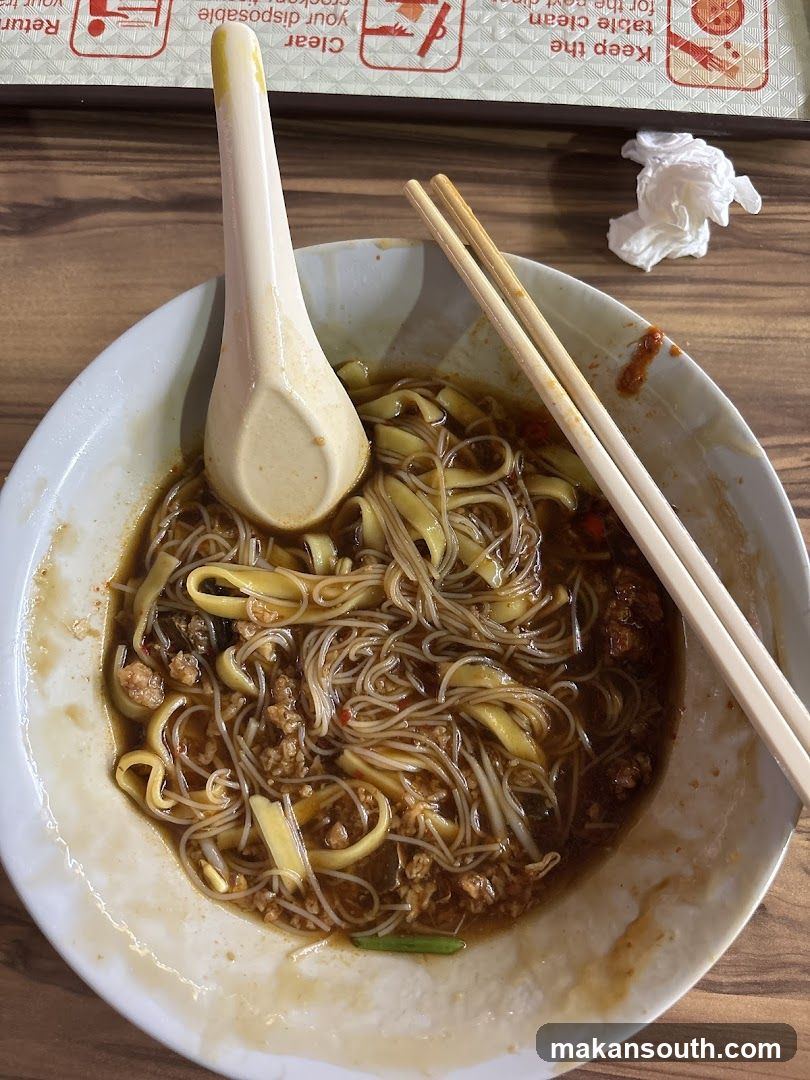 Noodle Dish with Spoon and Chopsticks