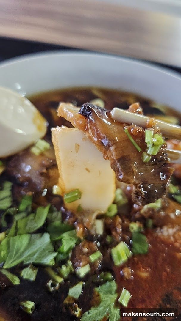 Close-up of Braised Meat and Tofu in Broth