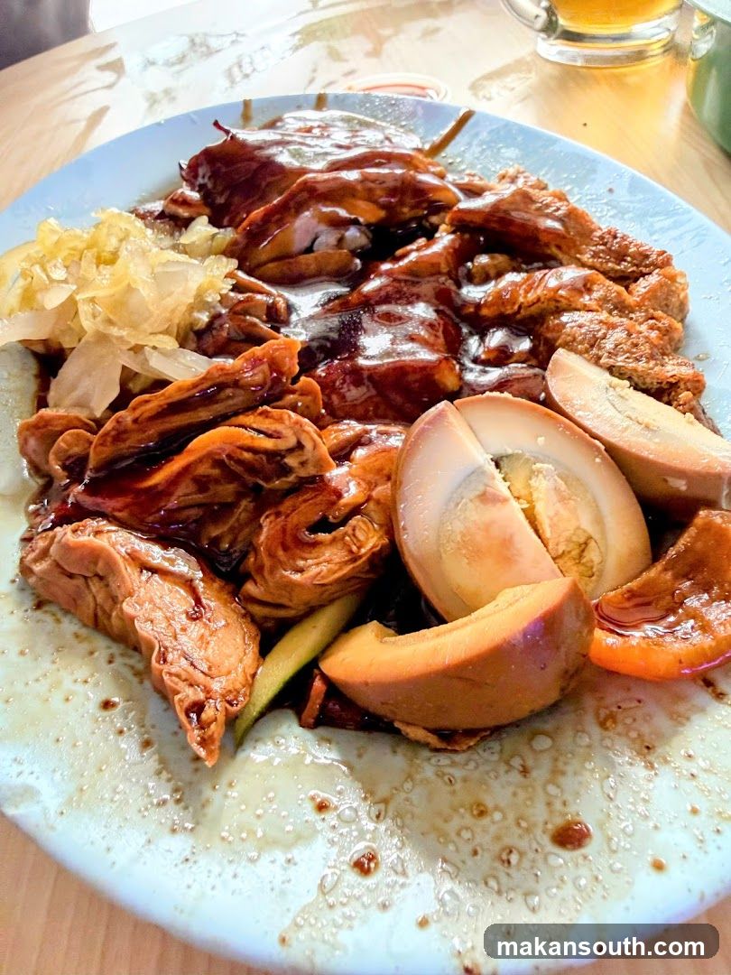 Braised Pork Intestines with Eggs and Pickled Vegetables