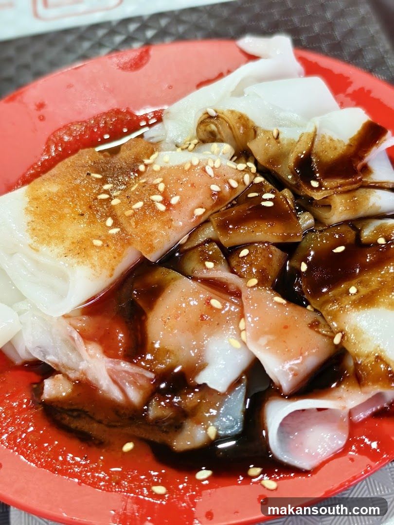 Cheung Fun with Sauce and Sesame Seeds