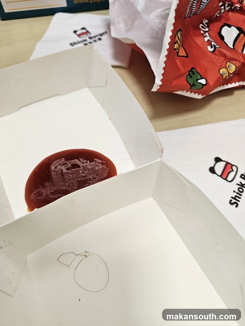 Burger packaging with ketchup