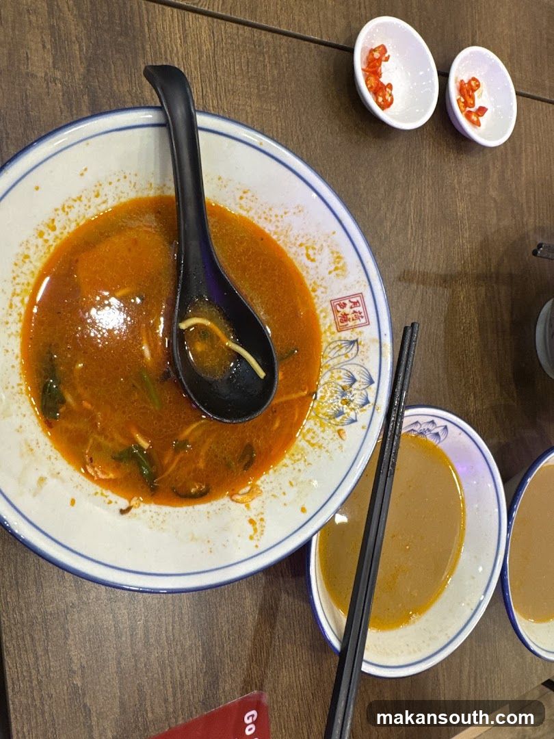 Spicy Noodle Soup with Condiments