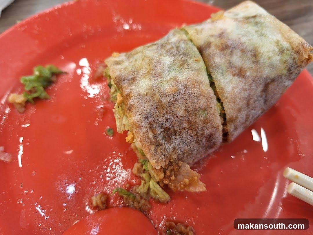 Spring Roll on Red Plate