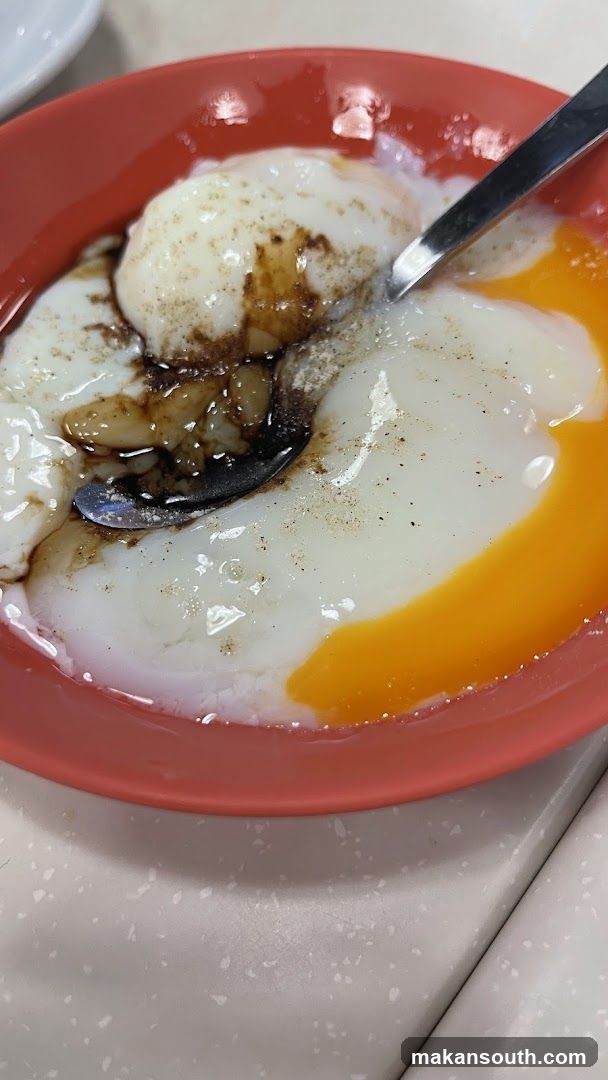 Soft-boiled eggs with soy sauce and pepper