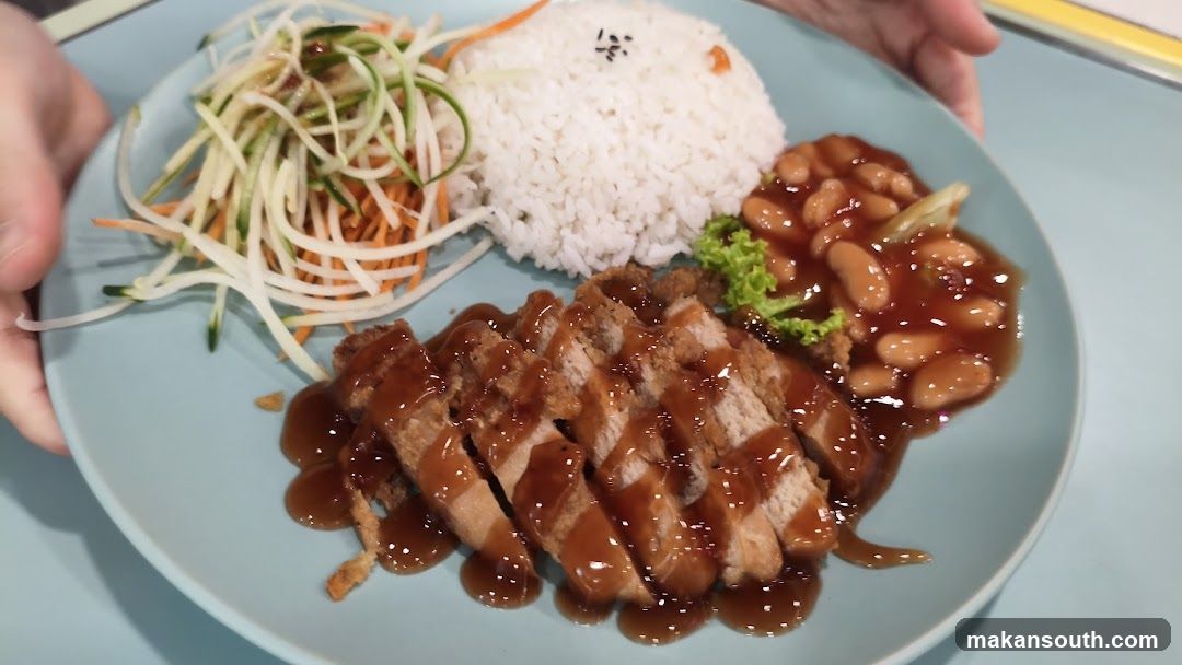 Sliced Pork with Rice and Beans