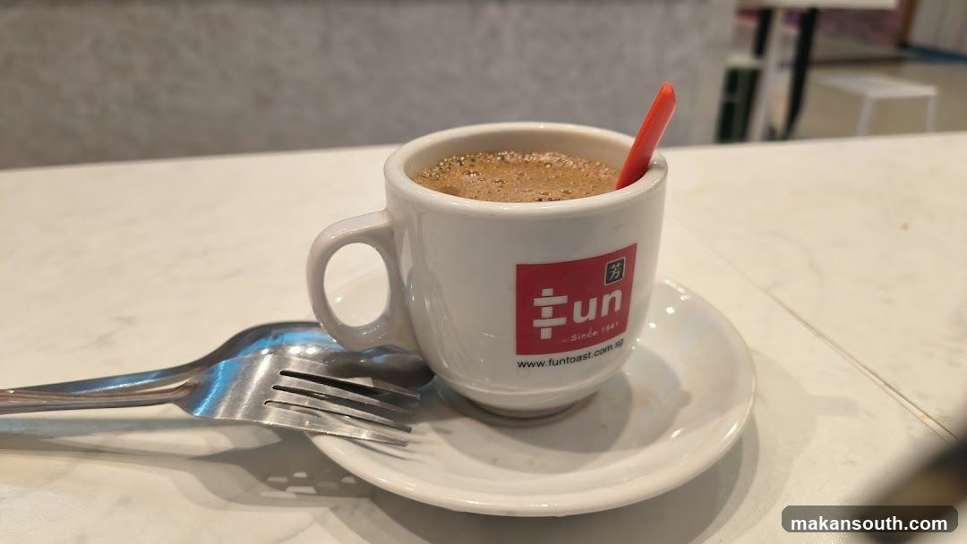Coffee with a Red Stirrer