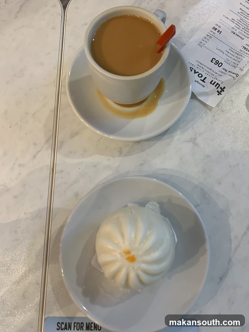 Coffee and Bun with Receipt