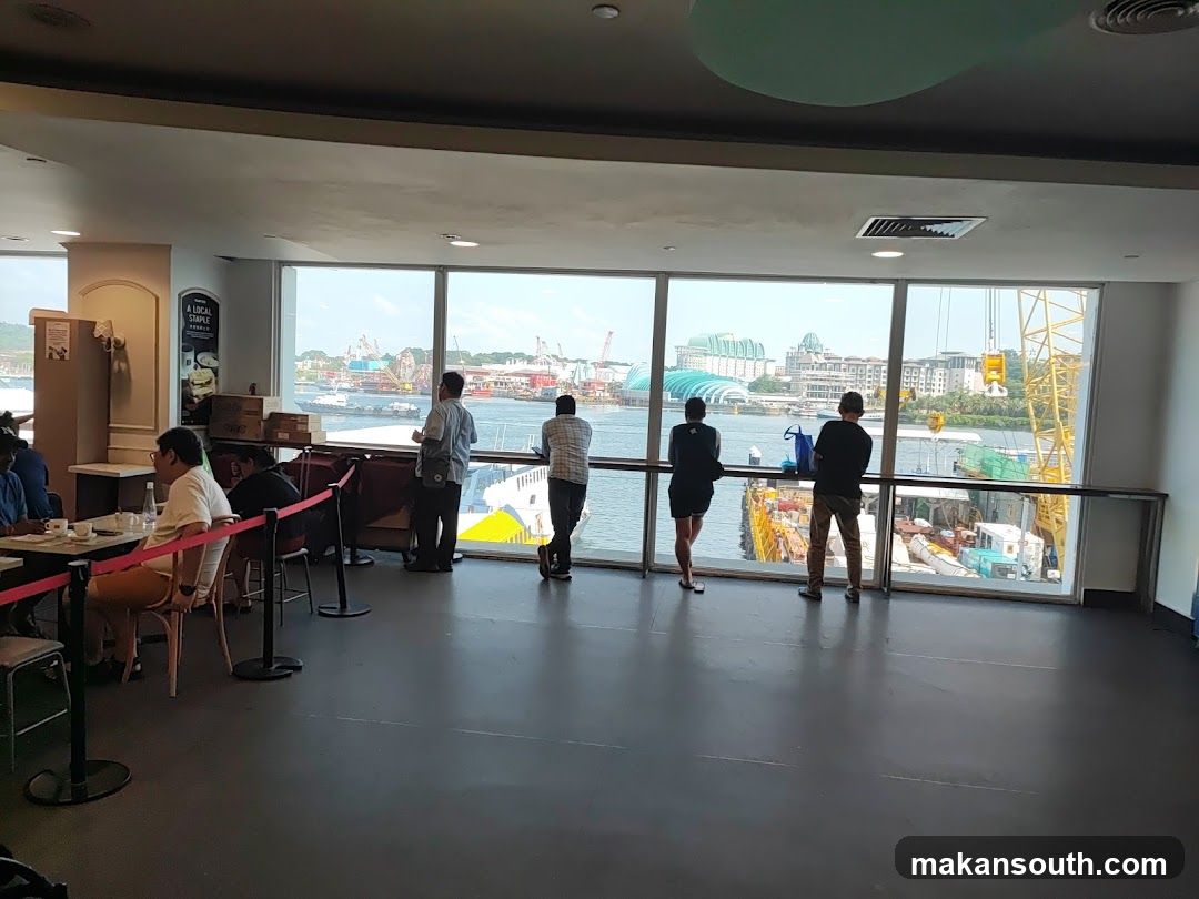 People looking out at a harbor