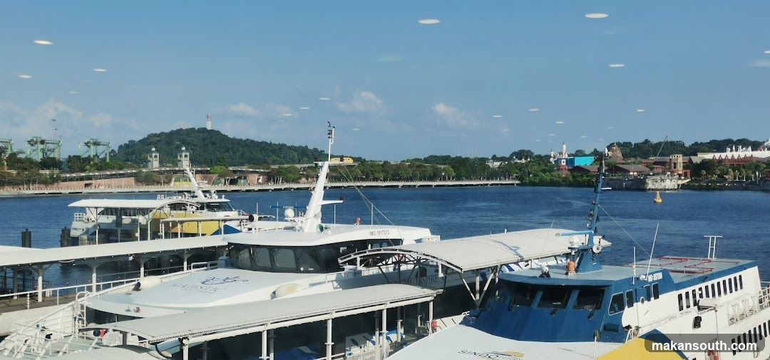 Ferries docked at a harbor