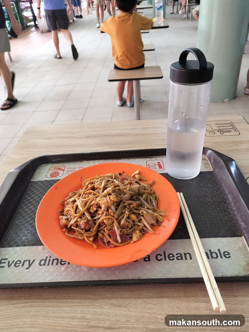 Food Tray with Noodles and Water Bottle