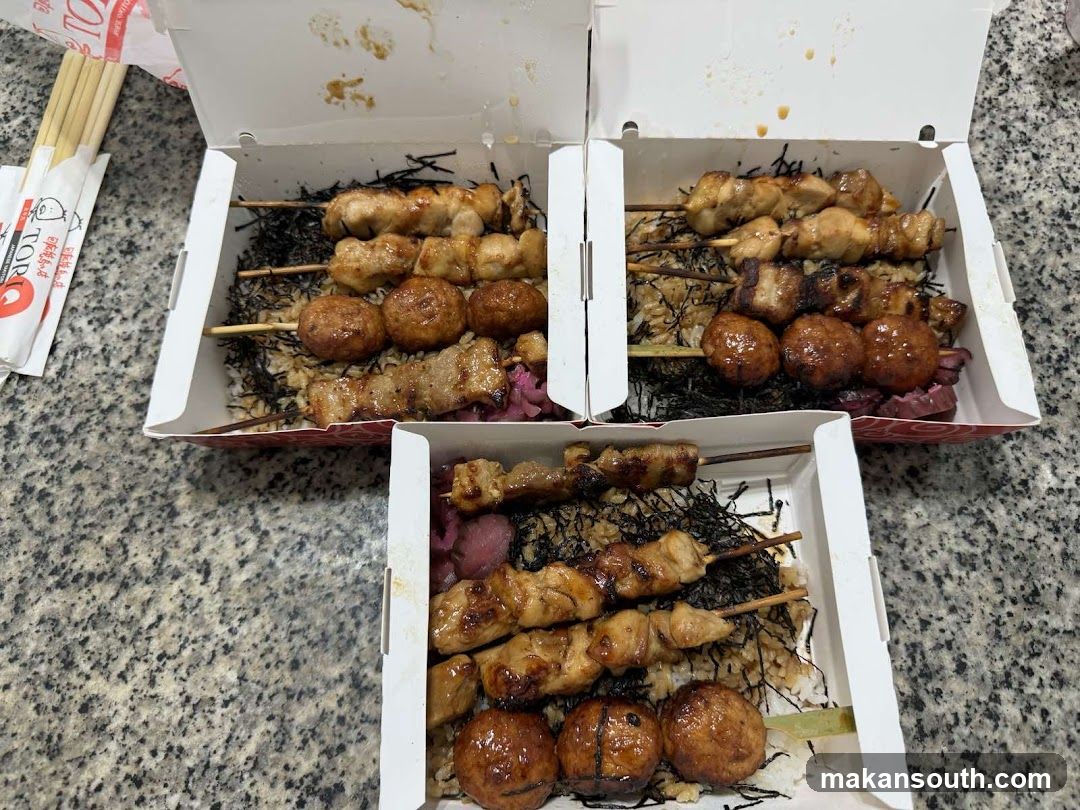 Skewers in a Takeout Box