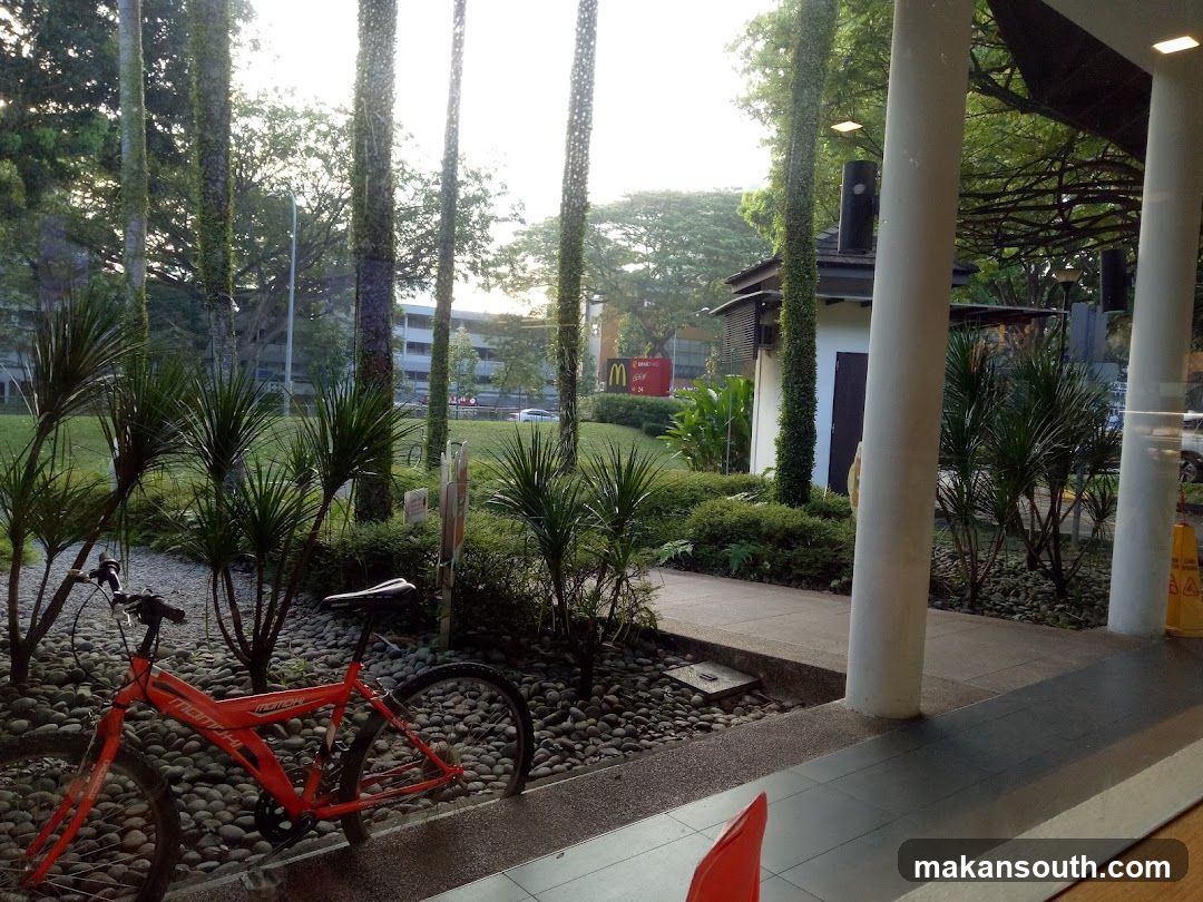 Outdoor seating area with a bicycle