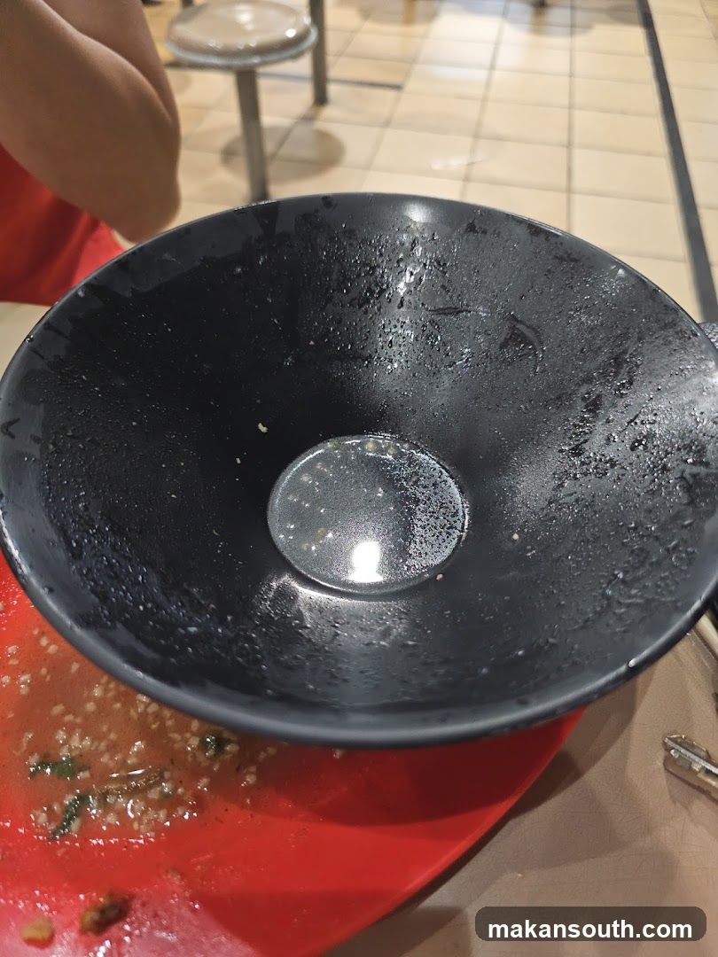 Empty Bowl with Leftover Food