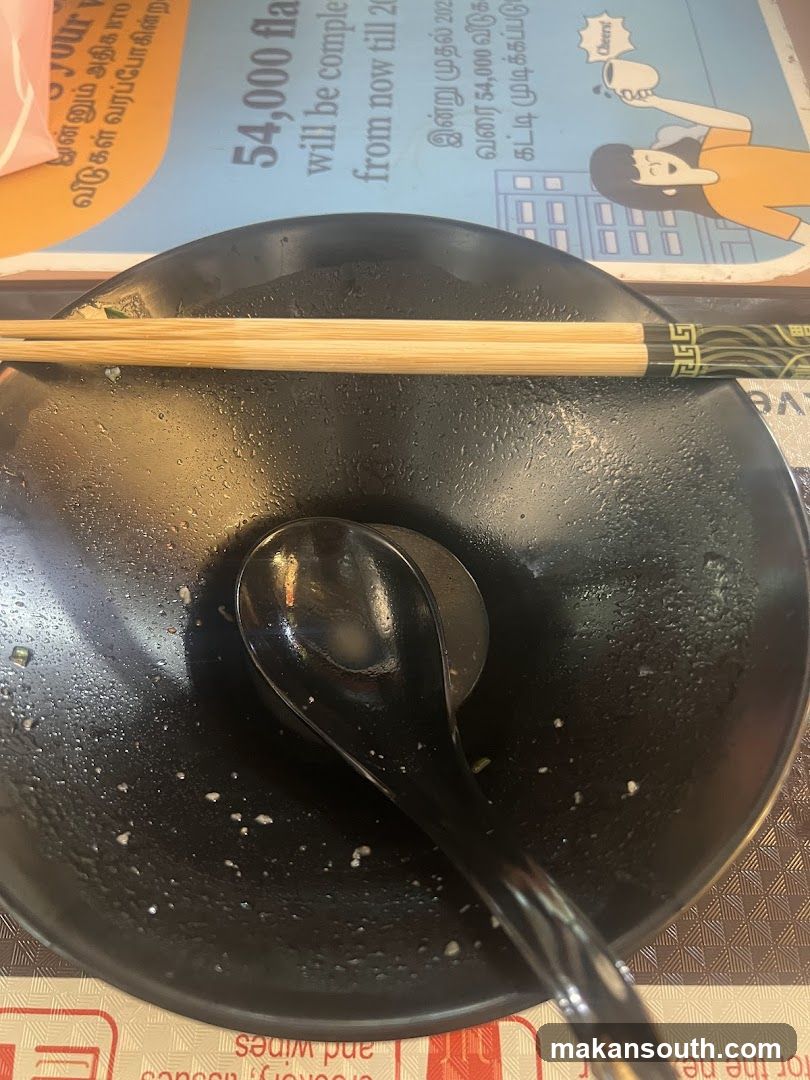 Empty Bowl with Chopsticks and Spoon