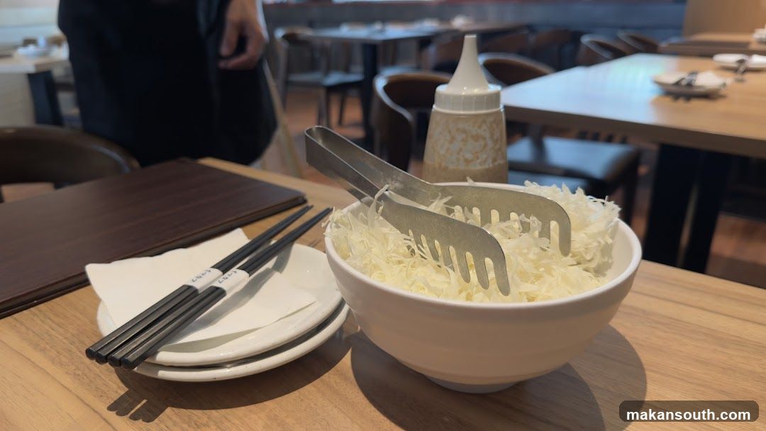 Shredded Cabbage with Tongs