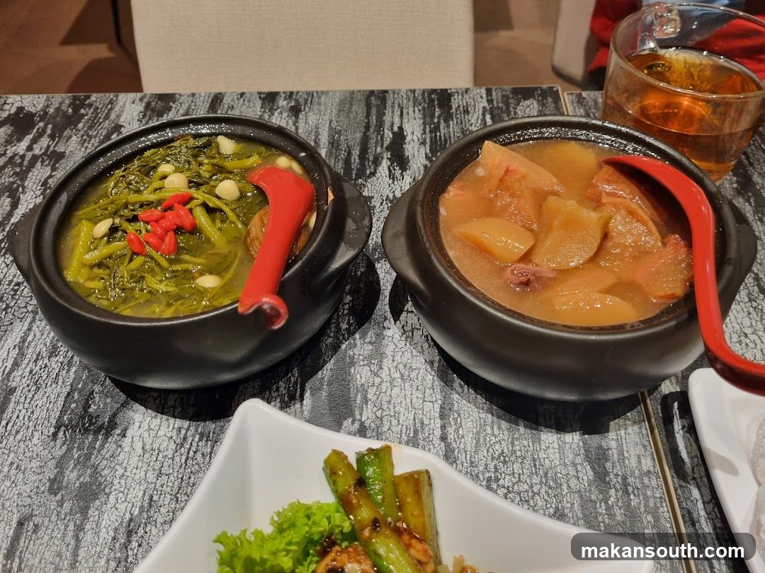 Two Bowls of Soup and a Drink