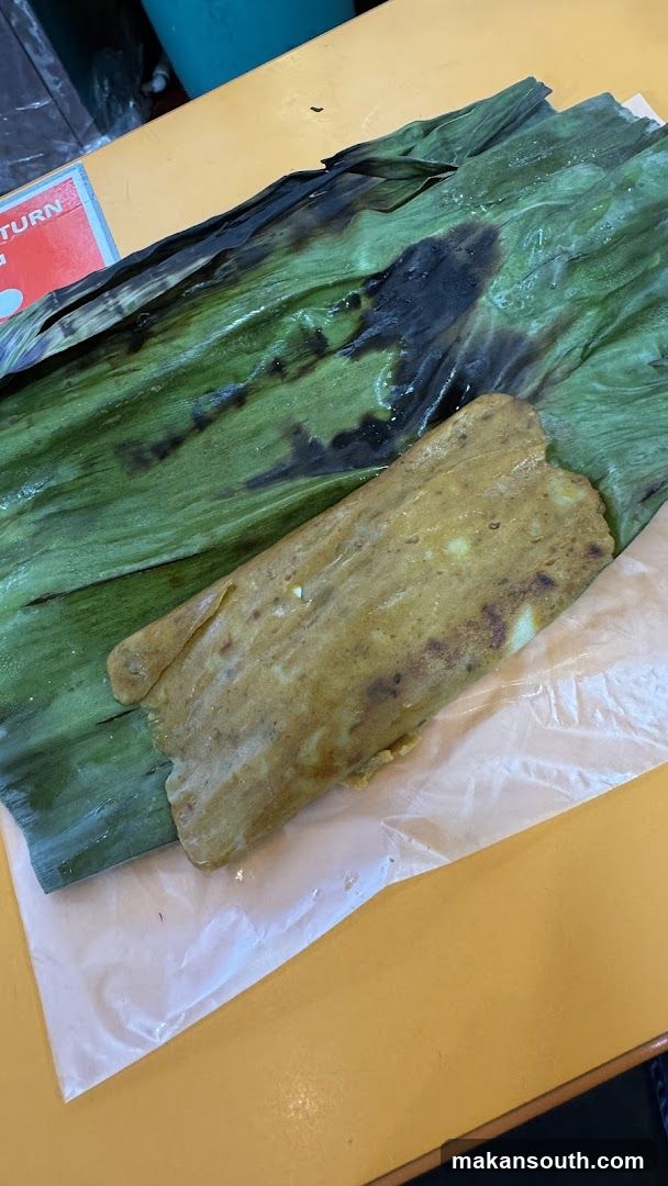 Tamale wrapped in banana leaf