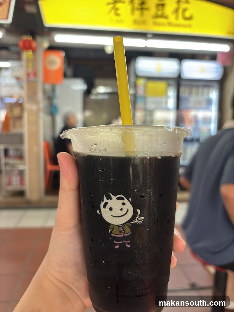 Black Drink with Cartoon Logo