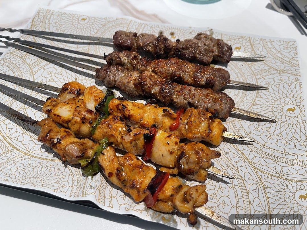 Skewers of grilled meat and chicken