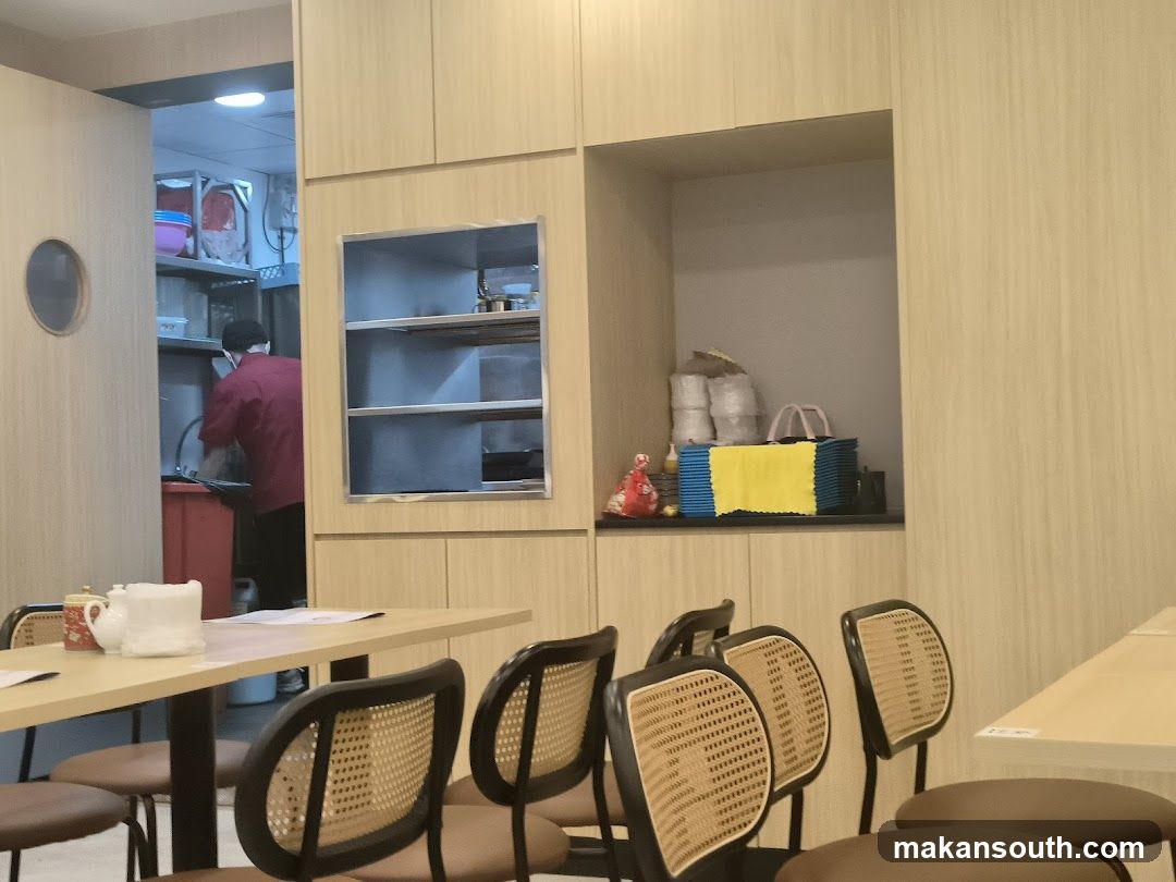 Restaurant Interior with Staff in Kitchen