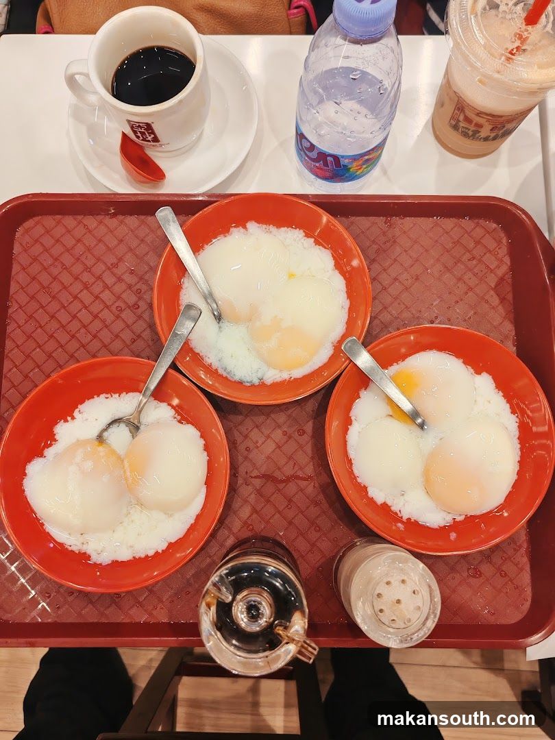 Soft-boiled eggs and coffee