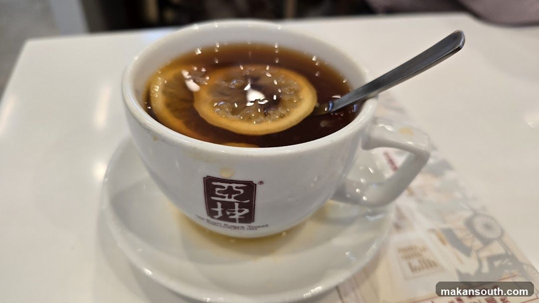 Cup of tea with lemon slices
