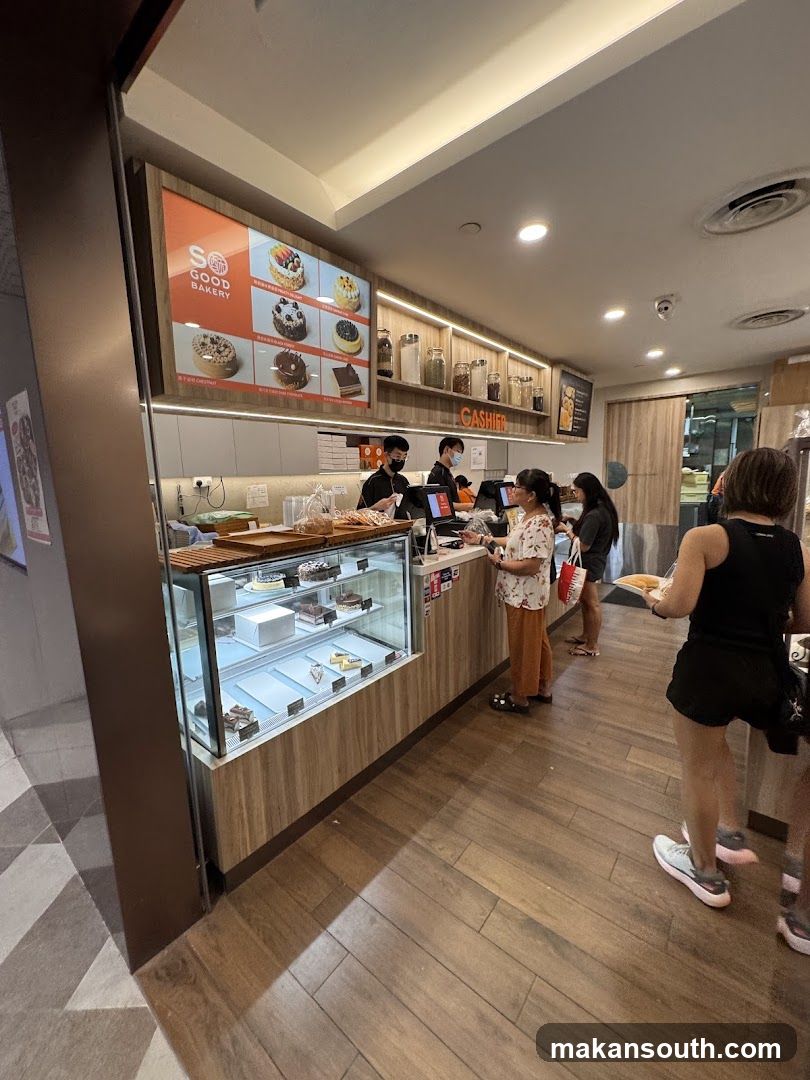 Bakery Interior with Display Cases and Customers