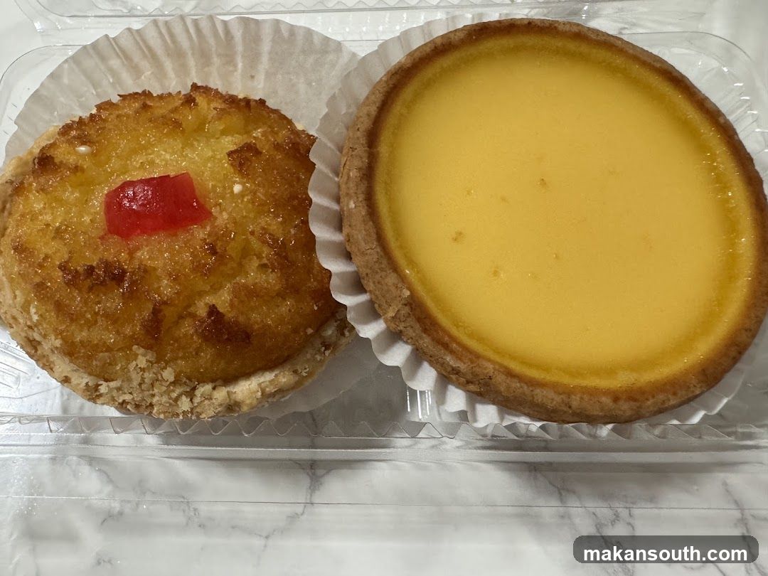 Two pastries in a clear container