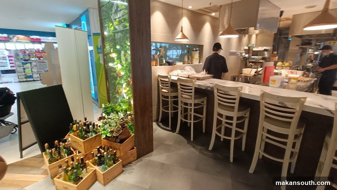 Bar Seating and Kitchen Area