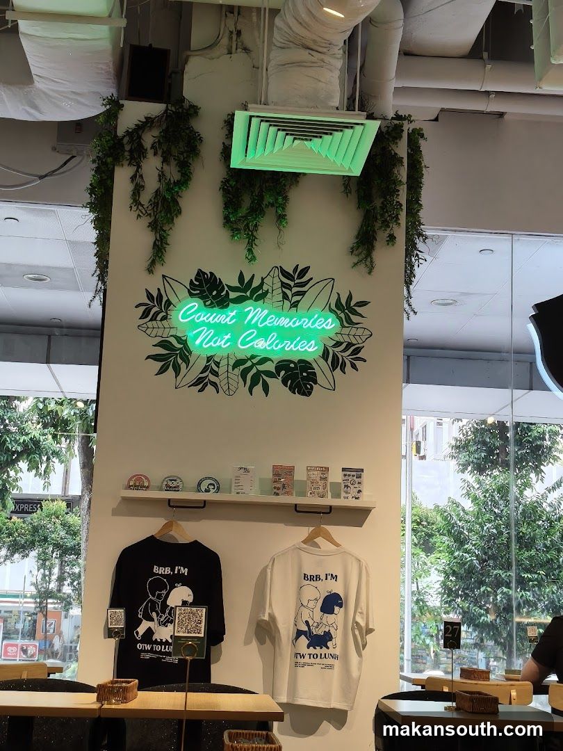 Cafe Interior with Neon Sign and Merchandise
