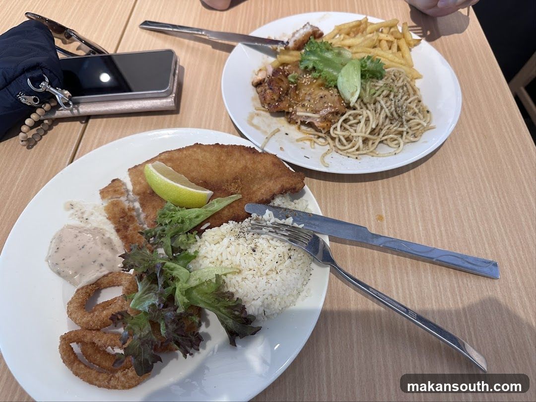 Two plates of food on a table