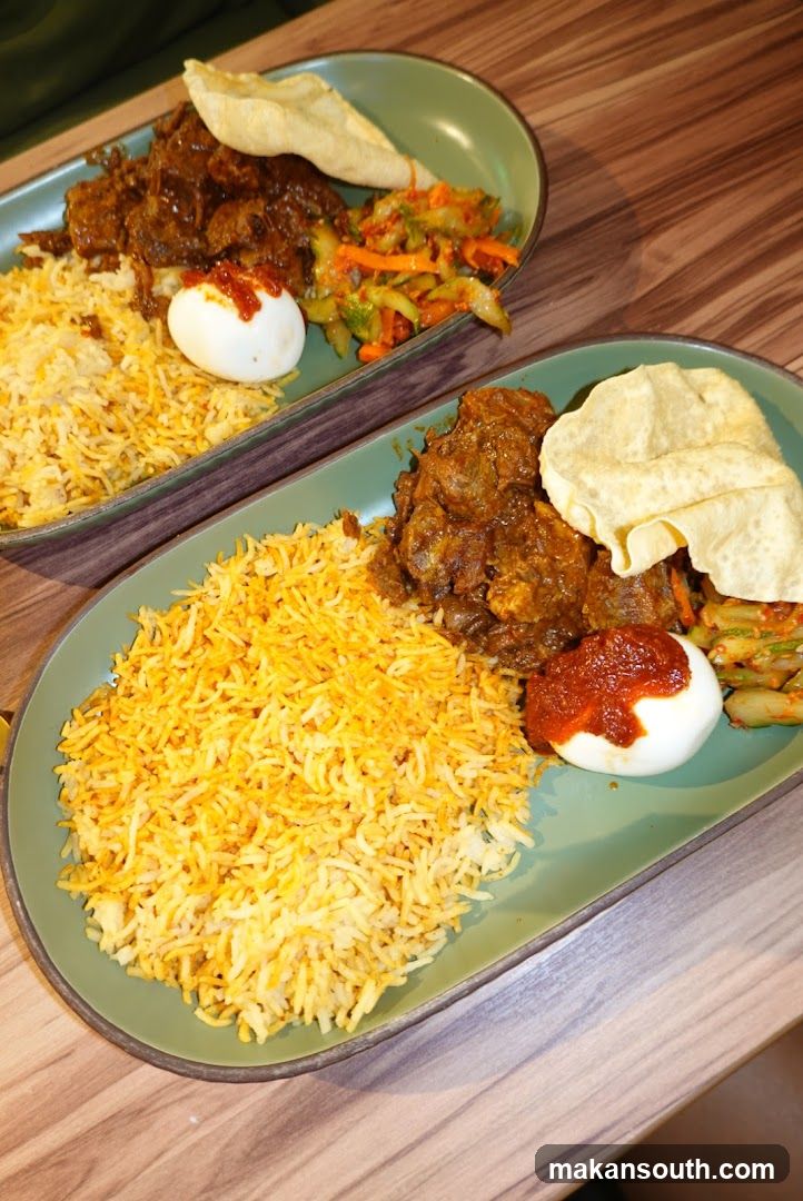Two plates of biryani