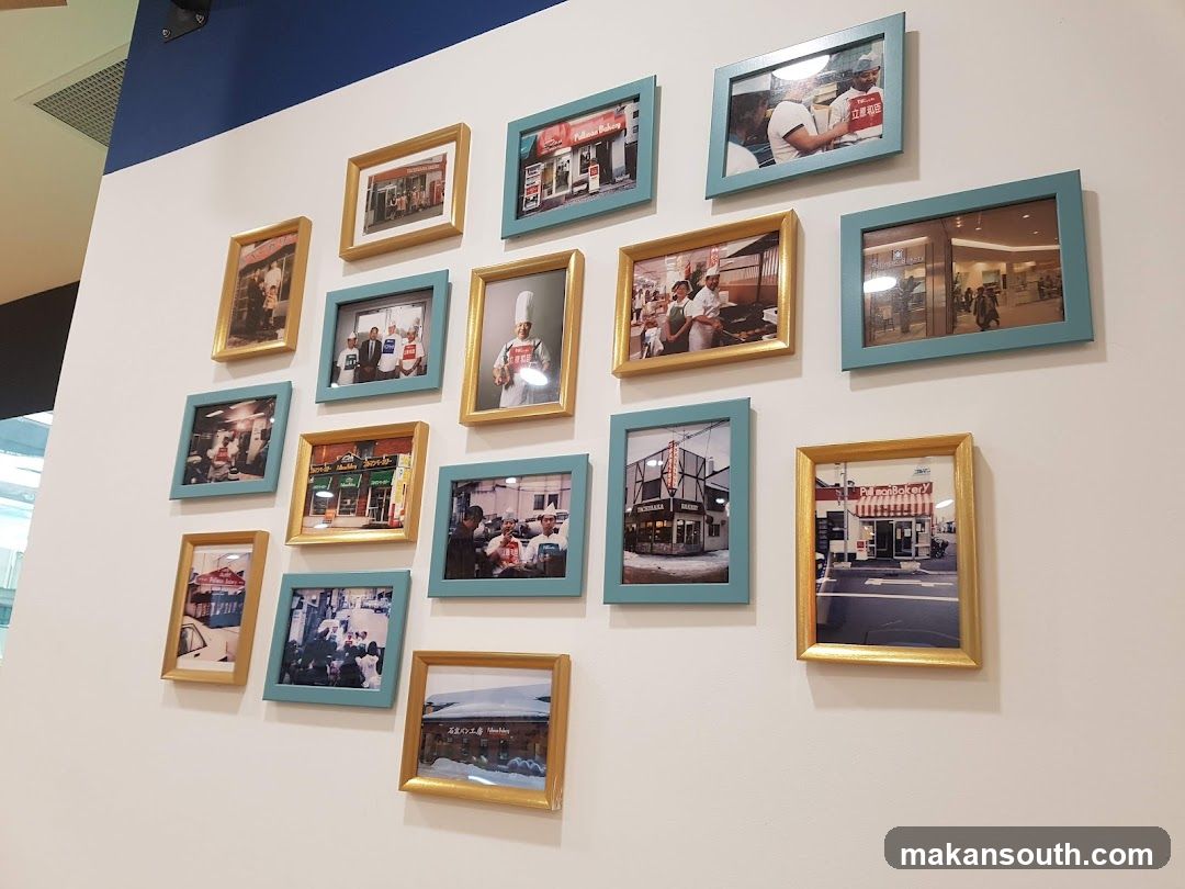 Framed photographs on a wall