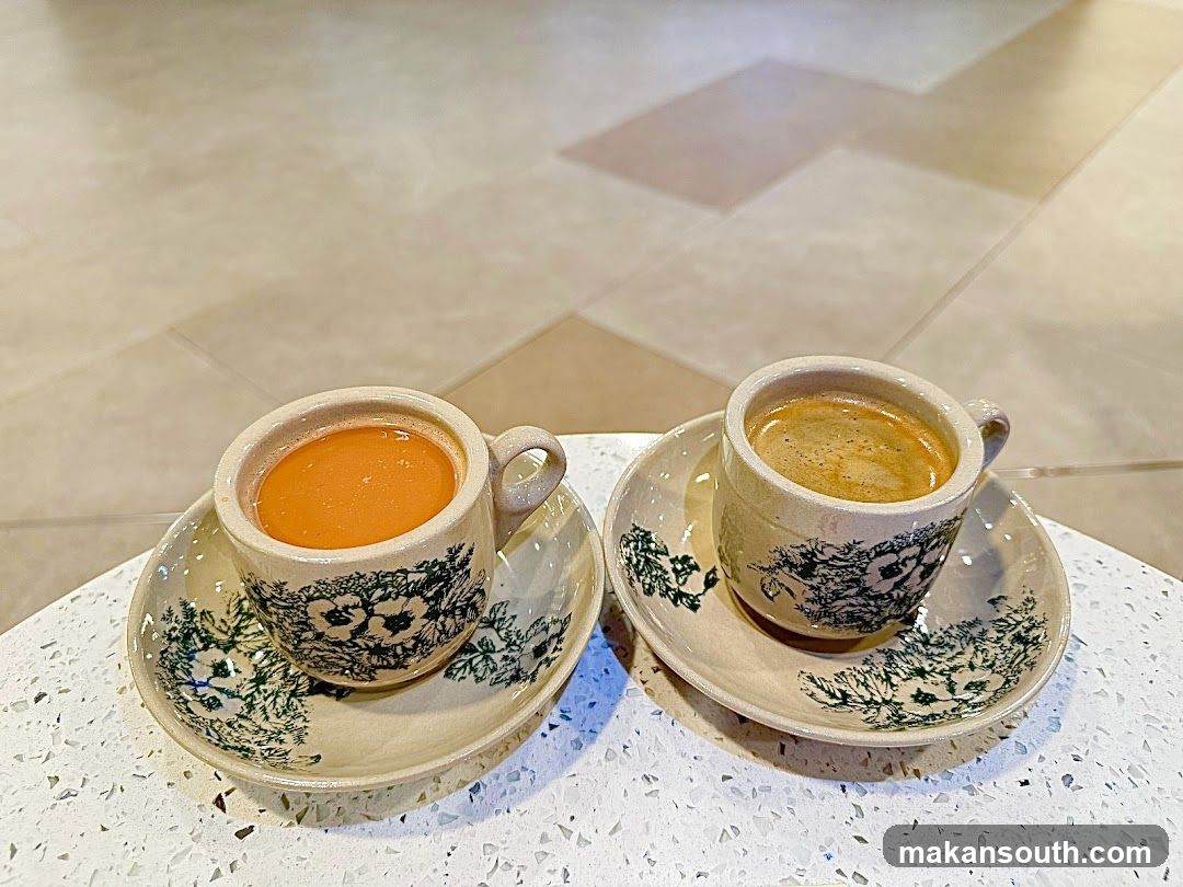 Two cups of coffee on saucers