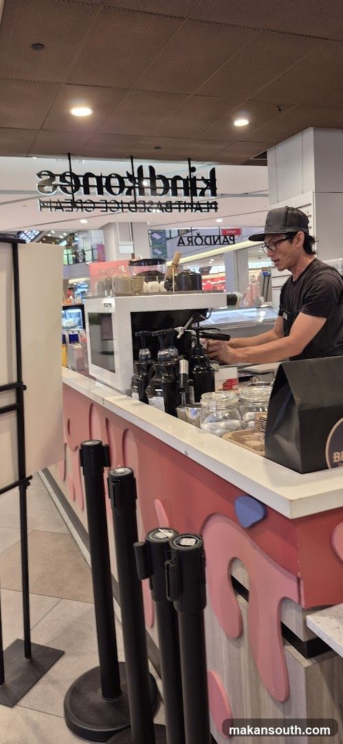 Barista preparing drinks at a counter