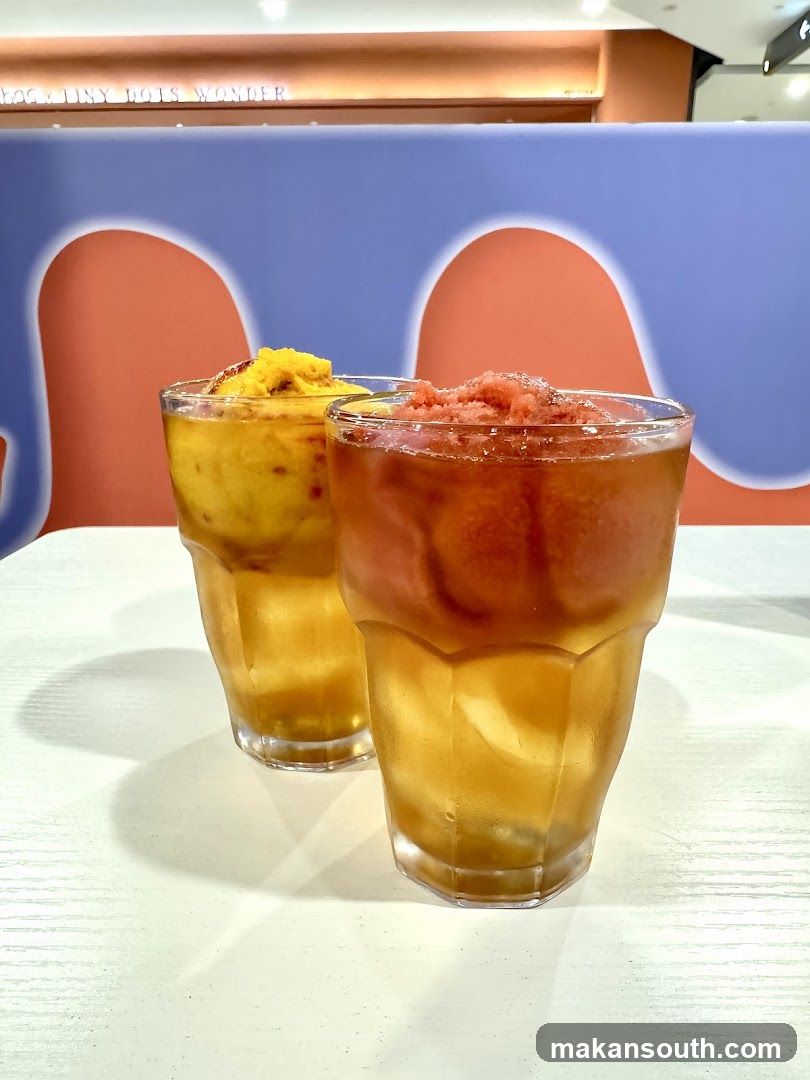 Two drinks with toppings