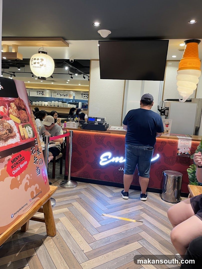 Restaurant Interior with Customers and Counter