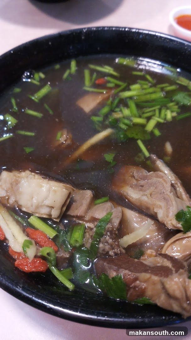 Bowl of Stewed Meat with Herbs