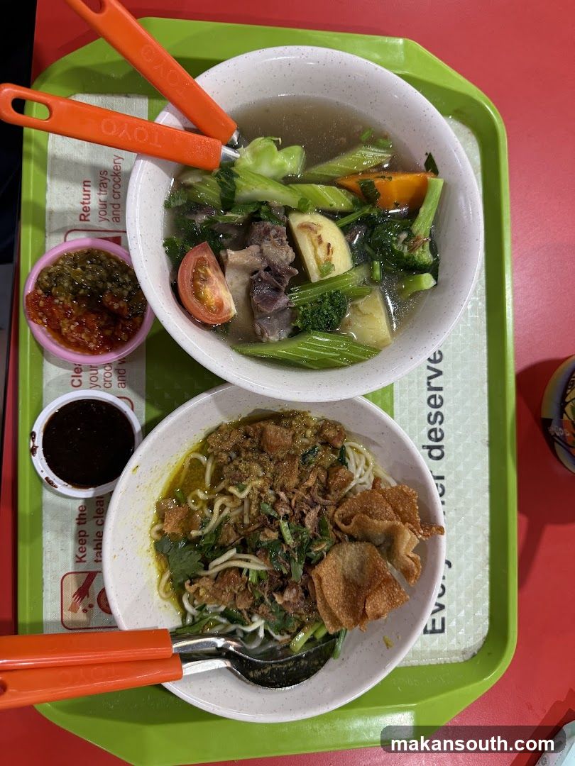 Two bowls of noodles and soup